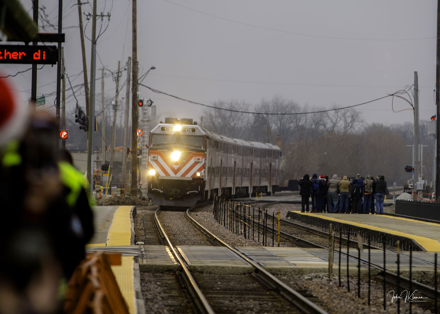 The Operation North Pole Metra train arriving at Pingree Road station